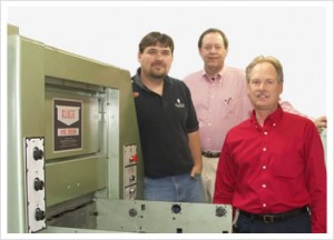 Pictured from left: Scott Wiegers, Lead Pressman, Gregory Greenwald, President, Scarab Printing Arts and Tim Meihls, Central Region Sales Manager, Brandtjen & Kluge, LLC.
